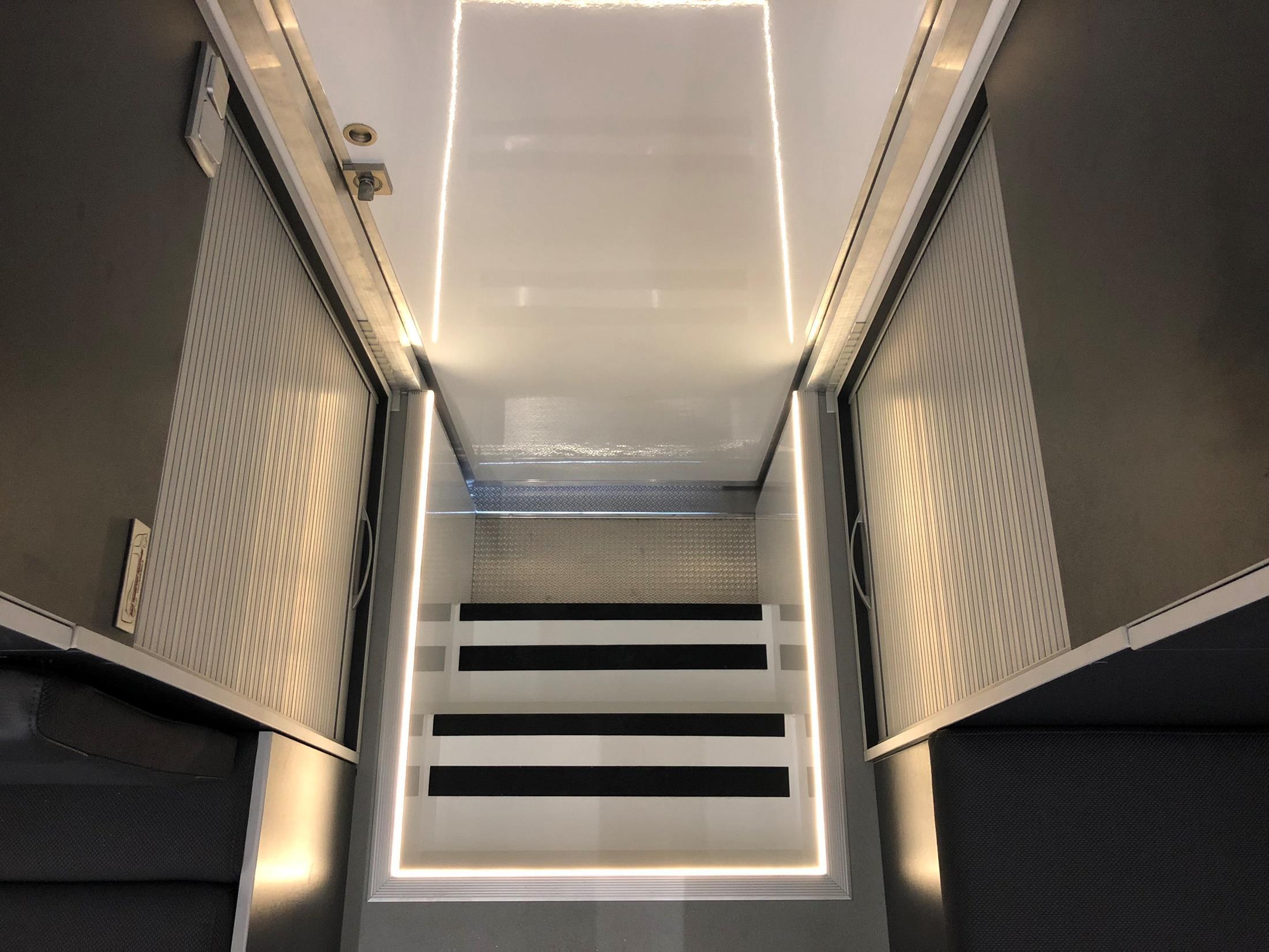 Staircase and entrance inside the MAN TGS transporter